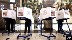 Voters cast their ballots at the Bronx County Supreme Court in New York on Election Day, Nov. 5, 2024.