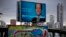 A photo of candidate Martin Insaurralde of the ruling Frente para la Victoria party, or Front for Victory, appears in a banner that reads in Spanish "Today there is a future and it belongs to all of us" in Buenos Aires, Oct. 23, 2013. 