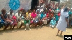 Women waiting to be screened for cervical cancer in Mhangura, Zimbabwe