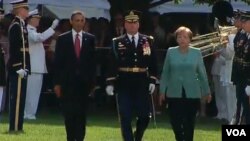 El presidente Barack Obama y la canciller Angela Merkel, durante la ceremonia oficial de bienvenida a la Casa Blanca.