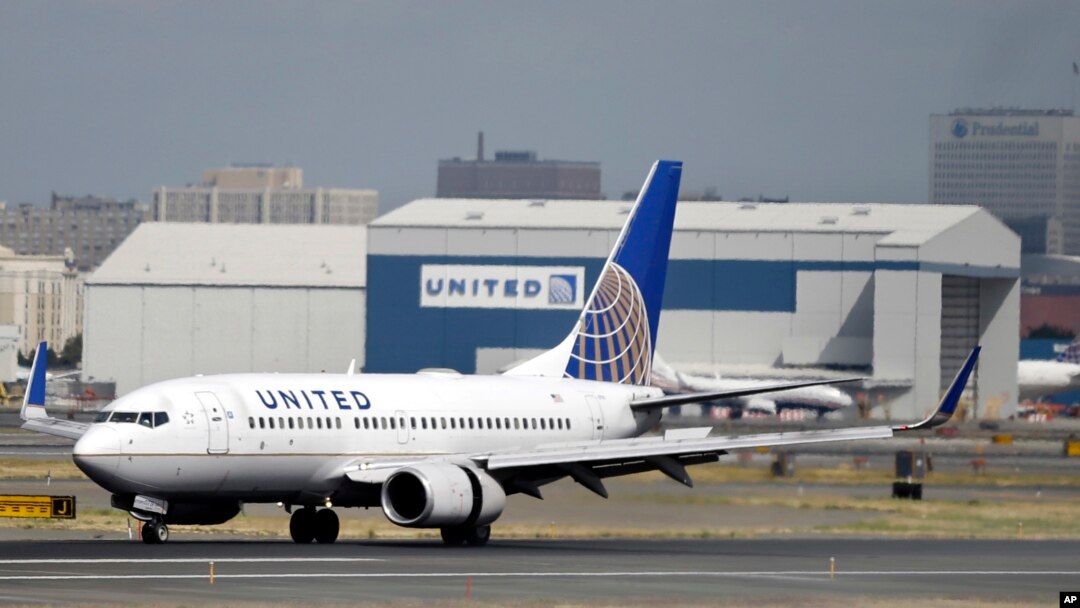 FILE - United Airlines passenger plane lands at Newark Liberty International Airport in Newark, New Jersey. 