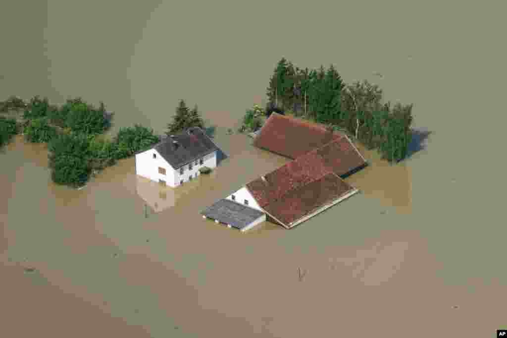 Aerial view of a flooded farm house near the river Danube in Deggendorf, southern Germany. Heavy rainfalls in the past days caused flooding along rivers and lakes in Germany, Austria, Switzerland, Hungary and the Czech Republic.