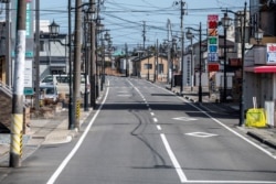 A picture taken on March 1, 2021, shows the main street of Namie, Fukushima Prefecture. The town was part of an exclusion zone around the Fukushima Daiichi nuclear plant since the 2011 accident but has since partially reopened.
