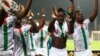 Burkina Faso's players celebrate their victory over Tunisia and their qualification for the semi-finals in Cameroon, Jan. 29, 2022.