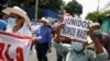 Salvadoreños protestan contra proyectos del Gobierno en San Salvador el 3 de septiembre de 2021.