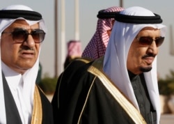 FILE - Saudi Arabia's Crown Prince Mohammed bin Nayef, left, seen here with his uncle King Salman, right, in Riyadh, Jan. 27, 2015.