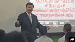 China's Vice President Xi Jinping speaks to students, on the outskirts of Bangkok, Thailand, December 23, 2011.