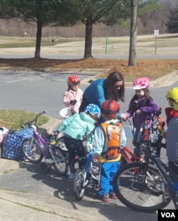 Pedal Power Kids review the ABC's of bike maintenance before hitting the road. (F.Elmasry/VOA)