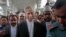 FILE - Bangladesh's Attorney General Mahbubey Alam, center, leaves court after the death sentences given to two opposition leaders for 1971 war crimes was upheld in Dhaka, Bangladesh, Nov. 18, 2015. 