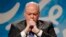 FILE - Ford Motor Company CEO Jim Hackett listens to a question in Dearborn, Mich., May 22, 2017.