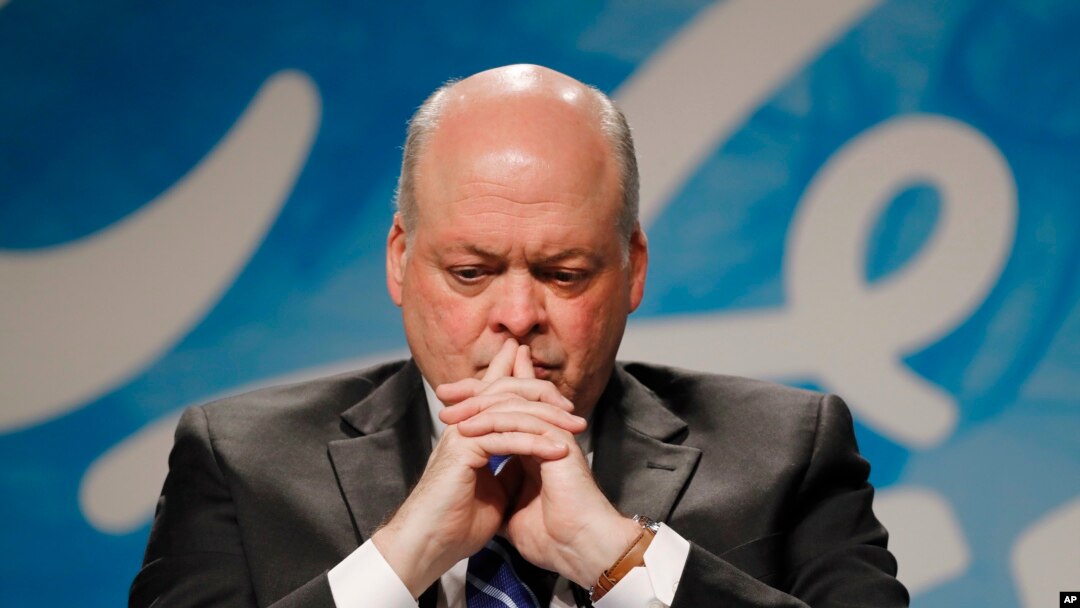FILE - Ford Motor Company CEO Jim Hackett listens to a question in Dearborn, Michigan, May 22, 2017.