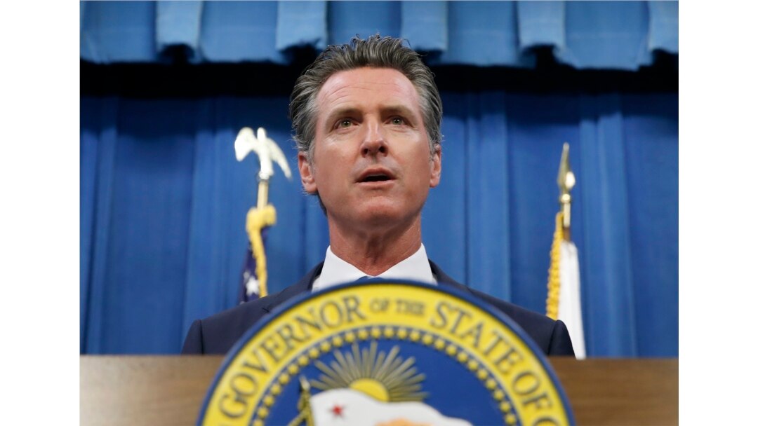 FILE - California Gov. Gavin Newsom addresses a news conference in Sacramento, Calif., July 23, 2019.