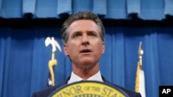 FILE - California Gov. Gavin Newsom addresses a news conference in Sacramento, Calif., July 23, 2019.