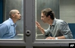 Jesus Martinez (Michael Pena) left, and Mick Halle (Matthew McConaughey) right in "The Lincoln Lawyer"
