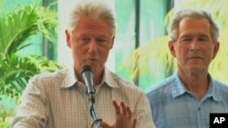 Former presidents Bill Clinton and George Bush speak about giving aid to Haiti. (file)