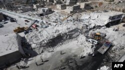 지난달 12일 시리아 이들리브에서 폭격으로 파괴된 건물.