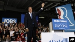Republican presidential candidate, former Massachusetts Gov. Mitt Romney, arrives for a campaign stop in West Allis, Wisconsin, Nov. 2, 2012.