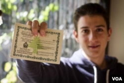 Unable to claim Lebanese citizenship despite living in the country all his life, 20-year-old Bassam Nahhas must carry a residency permit. He is planning to leave the country (VOA/J. Owens).