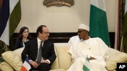 فرانسوا اولاند رئیس جمهوری فرانسه و محمدو بوهاری رئیس جمهوری نیجریه 