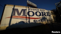 A banner promoting Republican Senatorial candidate Roy Moore is pictured on the side of a building in Birmingham, Alabama, Dec. 10, 2017.