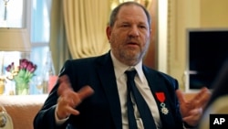 FILE - U.S. movie mogul Harvey Weinstein is seen during an interview in Paris, March 7, 2012, the same day he was named Chevalier of the Legion of Honor by then French president Nicolas Sarkozy.