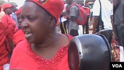  A protester 'beating' a pot in Chinhoyi in a peaceful demonstration staged by the MDC-T. (Photo: Arthur Chigoriwa)