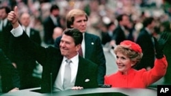 President Ronald Reagan and his wife Nancy during the inaugural parade in Washington following his swearing in as the 40th president of the United States on January 20, 1981