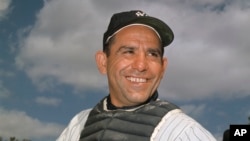 File-New York Yankee catcher Yogi Berra poses at spring training in Florida, in an undated file photo. Berra, the Yankees Hall of Fame catcher died in 2015. He was 90. (AP Photo/File)