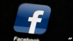 FILE -The Facebook logo is displayed on an iPad in Philadelphia, Pennsylvania.