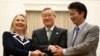 U.S. Secretary of State Hillary Rodham Clinton, left, South Korean Foreign Minister Kim Sung-hwan, center, and Japanese Foreign Minister Koichiro Gemba shake hands before their trilateral meeting during the ASEAN Regional forum in Phnom Penh, Cambodia, Ju