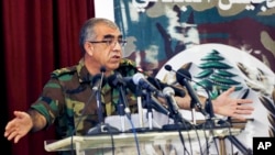 Brig. Gen. Ali Qanso, chief military spokesman, at the Lebanese Defense Ministry in Yarzeh near Beirut, Lebanon, Aug. 19, 2017. Lebanon's U.S.-backed army launched operations against Islamic State group positions inside the country Saturday, to start the most serious engagement with the militants since they found a foothold here in 2014. 
