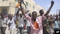 Somali protesters march in Mogadishu, Somalia where protesters took to the streets in support of current Prime Minister Mohamed Abdullahi Farmajo. A new accord extending the government's term by a year requires Prime Minister Mohamed Abdullahi Mohamed to