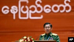 Myanmar's Army Commander Senior Gen. Min Aung Hlaing speaks during the opening ceremony of the third session of the 21st Century Panglong Conference at the Myanmar International Convention Center in Naypyitaw, Myanmar, July 11, 2018. 