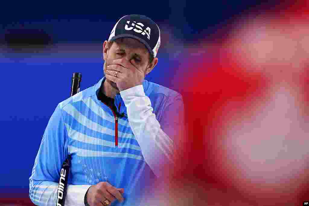 United States&#39; John Shuster reacts after a bad throw during the men&#39;s curling bronze medal match between Canada and the United States at the Beijing Winter Olympics in Beijing.