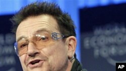 Irish musician Bono speaks during the World Economic Forum in Davos, January 28, 2011