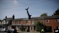 The Heine home in Oxford, England has been a notable site for years due to its shark sculpture. It, however, was not a protected landmark until a recent city council decision.