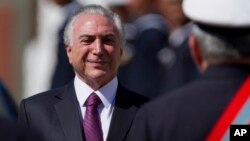 Investigadores de la policía federal dijeron que tienen evidencia suficiente de que se pagaron sobornos como para garantizar una investigación a Temer por "corrupción pasiva".