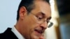 Austrian Vice Chancellor Heinz-Christian Strache reacts as he addresses the media in Vienna, May 18, 2019.