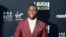 FILE - Kevin Hart poses at Kevin Hart's "Laugh Out Loud" new streaming video network launch event at the Goldstein Residence in Beverly Hills, California, Aug. 3, 2017. Hart pledged $25,000 to Hurricane Harvey relief efforts Sunday, Aug. 27, 2017, and called on fellow celebrities to do the same. 