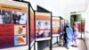 FILE - Visitors view an exhibition depicting the years under which Chad was ruled by dictator Hissene Habre, on July 15, 2015 at the Douta Secke Cultural Center in Dakar. 