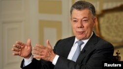 El saliente presidente de Colombia, Juan Manuel Santos la decisión final sobre el cese el fuego con el ELN recaerá en el nuevo gobierno.