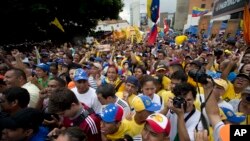 Unjuk rasa menentang pemerintah Presiden Nicolas Maduro. Caracas, Venezuela. (AP Photo/Ariana Cubillos)