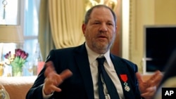 FILE - U.S. movie mogul Harvey Weinstein is seen during an interview in Paris, March 7, 2012.