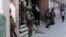Soldiers of the Jamaica Defense Force (JDF) stand guard outside the Electoral Office of Jamaica in Kingston, Feb. 29, 2016.