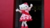 Hello Kitty waves as she appears to attend the opening ceremony of the exhibition "As I change, so does she," marking the 50th anniversary of Hello Kitty at the Tokyo National Museum in Tokyo, Oct. 30, 2024.