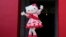Hello Kitty waves as she appears to attend the opening ceremony of the exhibition "As I change, so does she," marking the 50th anniversary of Hello Kitty at the Tokyo National Museum in Tokyo, Oct. 30, 2024.