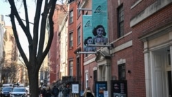 People stand outside "Anne Frank The Exhibition" during its official opening on International Holocaust Remembrance Day at the Center for Jewish History in New York, Jan. 27, 2025.