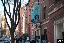 People stand outside "Anne Frank The Exhibition" during its official opening on International Holocaust Remembrance Day at the Center for Jewish History in New York, Jan. 27, 2025.