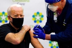 President-elect Joe Biden receives his second dose of the coronavirus vaccine at ChristianaCare Christiana Hospital in Newark, Del., Jan. 11, 2021.