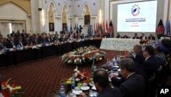 FILE - Delegates attend the 2nd Kabul Process conference at the Presidential Palace in Kabul, Feb. 28, 2018.